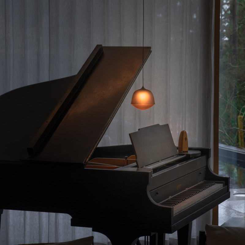 designlampe i oransje glass 
