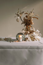 Bocci 14p portable oppladbar lampe på bord i klart glass 