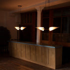 To stk Classic Double Pendel av Joe Armitage hengende over en lang benkeplate