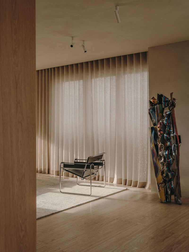 Knoll Wassily Loungestol med sort skinn og krom base 