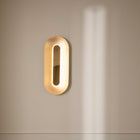 Nuura Sasi arge messing vegglampe