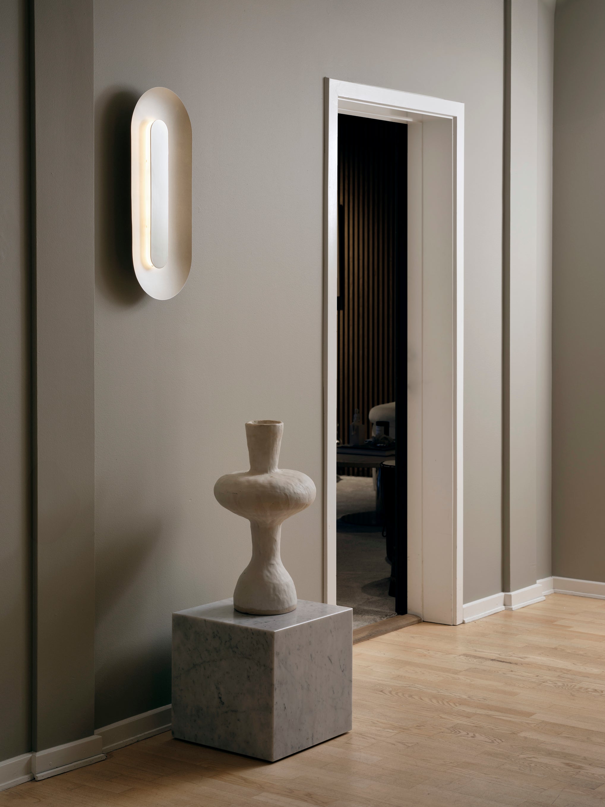 Saso krom vegglampe fra danske Nuura