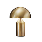 Atollo bordlampe fra Oluce i Satin Gull