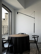 Nemo Swan Vegglampe i sort, justerbar høyde og lysretning