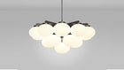 Cloudesley Chandelier fra CTO Lighting med ovale skjermer i matt opalglass