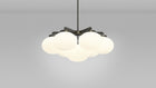 Cloudesley Chandelier fra CTO Lighting med ovale skjermer i matt opalglass
