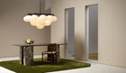 Cloudesley Chandelier fra CTO Lighting med ovale skjermer i matt opalglass