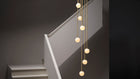 Mezzo Cluster Round pendel fra CTO Lighting med opalglasskjermer i ulike høyder