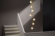 Mezzo Cluster Round pendel fra CTO Lighting med opalglasskjermer i ulike høyder