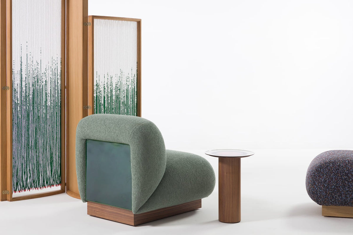 Moroso Clay Loungestol: grønn loungestol i interiør