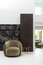 Moroso Pacific Loungestol: grønn loungestol ved peis