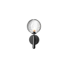 Sort vegglampe fra Nuura